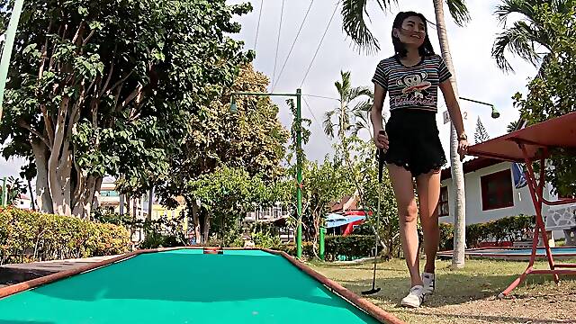 Asian amateur babe flaunts her mini in nature's playground